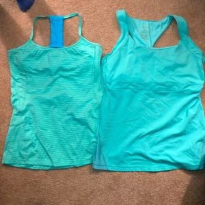 2 turquoise Kyodan workout tanks sz Med & Large
